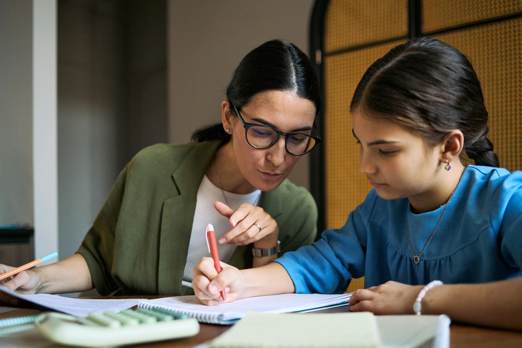 Tutor guiding a student during a learning session